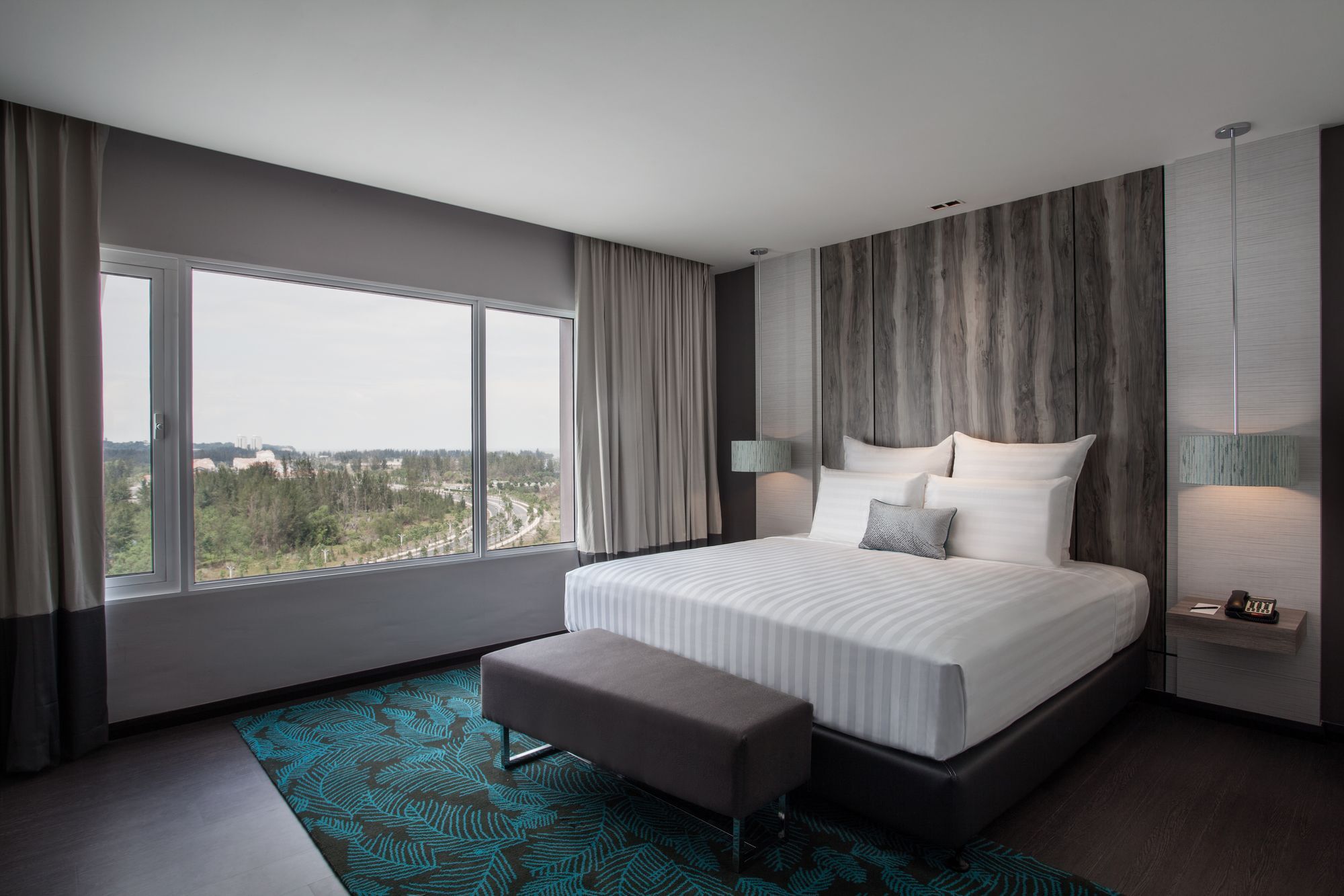 Pullman Miri Waterfront Hotel Kültér fotó Executive Suite bedroom
